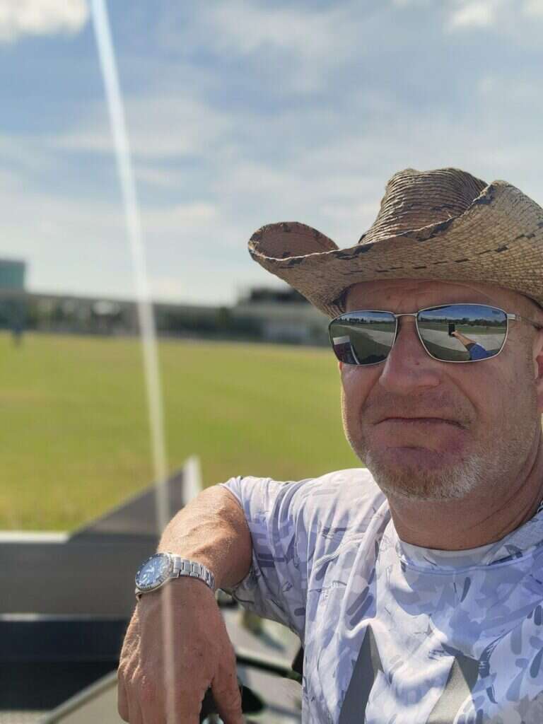 Gary Sykes, owner of Independent Aeration Services, on a Central Florida athletic field
